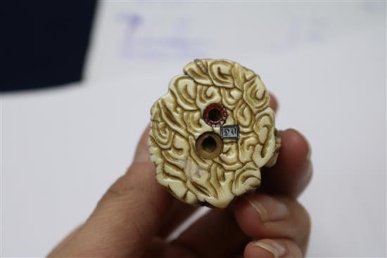 A Japanese ivory netsuke of multiple rakan, Meiji period, height 5.6cm